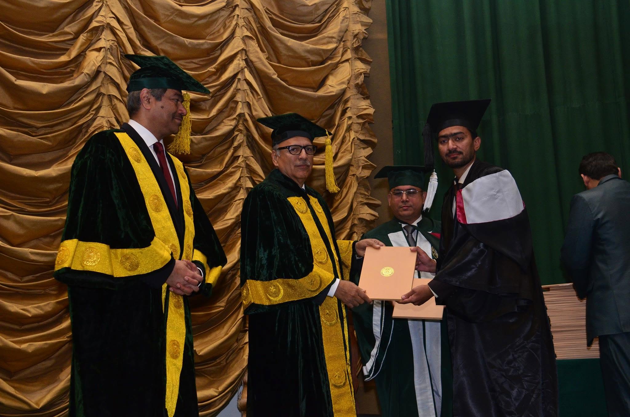 Receiving Graduation Degree from President of Pakistan
